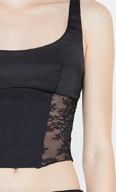 The BEC + BRIDGE Olympia Corset Top combines a timeless silhouette with modern lace detailing. Featuring a classic scoop neckline and wider straps, this top showcases a corset-style fit with seam lines. Stretch lace panels at the side seams and a soft mesh panel at the center front add a contemporary touch. Corset Top Black, Bec And Bridge, Bec Bridge, Prom Dress Shopping, Corset Style, Brides And Bridesmaids, Mesh Panel, Stretch Lace, Corset Top