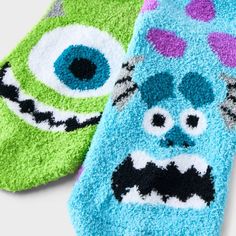 For all you Monsters, Inc. fans out there, here’s a fantastic addition to your wardrobe – the Women's 2-Pack Monsters, Inc. Cozy Ankle Socks in Green and Blue. These socks, available in sizes 4-10, are constructed from mid-weight fabric with a single-layered design, prioritizing your comfort. The ankle-length socks feature monsters prints. When it's time for a refresh, cleaning is a breeze – simply toss them in the washing machine and tumble dry. Keep your feet snug and cozy with these playful M Playful Super Soft Socks For Winter, Playful Super Soft Winter Socks, Comfortable Socks For Winter Playtime, Comfortable Winter Socks For Playtime, Comfortable Socks For Playtime In Winter, Comfortable Playtime Winter Socks, Playful Green Winter Socks, Playful Super Soft Multicolor Socks, Playful Multicolor Super Soft Socks