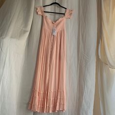 In Very Good Condition. Please See Photo Of Light Discoloration On Right Side Hip Of Dress. Rose Pink Polyester Half Lined Button Front Flared Off The Shoulder Ruched Bust Midi Dress. Measures 14” Wide Armpit To Armpit With Elastic 13” Wide Waist 28” Wide Hip And 49” Long Length Chic Pink Rayon Midi Dress, Spring Sundress Maxi Dress With Buttons, Feminine Rayon Dresses With Ruffles, Chic Pink Rayon Maxi Dress, Pink Buttoned Maxi Dress For Summer, Flowy Maxi Dress With Buttons For Brunch, Feminine Rayon Dress For Daywear, Chic Flowy Dress With Buttons, Feminine Midi Dress With Buttons For Vacation