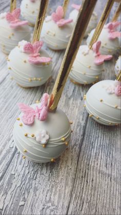 some white chocolate covered with pink and gold decorations