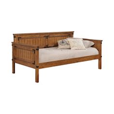 a wooden bed frame with two drawers on each side and pillows on the bottom, against a white background