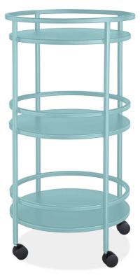 a three tiered shelf with wheels on the bottom, and two shelves below it