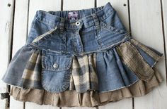 a denim skirt with ruffles on the bottom