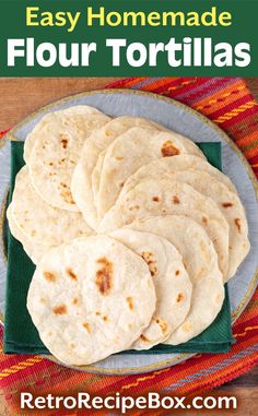 homemade flour tortillas on a plate with the title easy homemade flour tortillas