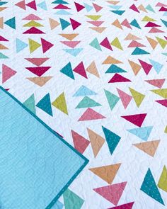 Looking for a BOLD and VIBRANT modern Flying Geese Quilt Pattern?! You will love this Blessings Quilt! It’s a total party! It’s vibrant, fun, and great for a beginner quilter who wants to learn a new quilt block technique! Learn more about the Blessings quilt pattern on the Homemade Emily Jane blog.