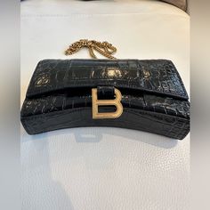 New Balenciaga Hourglass Chain Bag. Only Used Once For An Event. Have Original Dust Bag And Receipt Of Purchase. Price Is Final Designer Crocodile Pattern Shoulder Bag For Evening, Luxury Office Bags With Chain Detail, Luxury Office Bag With Chain Detail, Luxury Chain Shoulder Bag For Office, Luxury Chain Bags For Everyday, Luxury Office Shoulder Bag With Chain, Luxury Shoulder Bag With Chain For Office, Luxury Office Clutch With Chain Strap, Everyday Luxury Black Bag With Chain