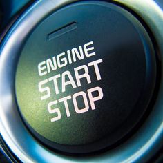 an engine start button with the words engine start stop written on it