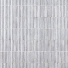 an image of a white tile wall that looks like it could be used as a background