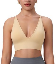 PRICES MAY VARY. V-neckline design enhances sexy breast curves. Adjustable spaghetti straps for personal adjustment. Padded and wireless bra with removable pads for comfort. Made with soft, moisture-wicking fabric for breathability and focus during practice. Versatile push-up bra for medium to low-impact sports and everyday use Yoga Crop Tops, Neckline Designs, Lounge Lingerie, Workout Yoga, Wireless Bra, Bra Lingerie, Push Up Bra, Moisture Wicking Fabric, Deep V Neck