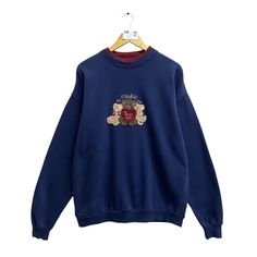 Code : p/680 Vintage Graphics Bear Navy Sweatshirt Size Large Graphics Bear Crewneck Graphics Bear Sweater Pullover Embroidered Logo Graphics Bear Jumper Size on Tag : XL Details Measurement  Arm Pit to Arm Pit : 25.5"inches Back Collar to Hem : 27"inches Condition :  Great Vintage Condition.❌NO HOLES AND NO STAIN❌.Please refer pictures detail.‼️ Pull And Bear, Embroidered Caps, Logo Graphic, Vintage Graphics, Girly Outfits, Jumper, Sweat Shirt, Crew Neck, Navy