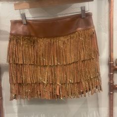 Brown Fringe Sparkle Skirt. Runs True To Size ! Brown High Waist Mini Skirt For Party, High Waist Brown Mini Skirt For Party, Brown Party Bottoms Short Length, Party Brown Short Bottoms, Brown Party Skort For Spring, Party Brown Short-length Bottoms, Party Brown Short Length Bottoms, Brown High Waist Party Skirt, High Waist Brown Skirt For Party