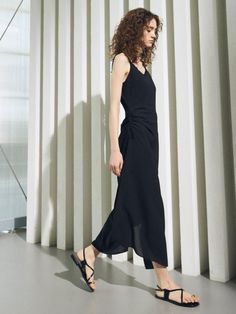 This is a casual and feminine dress by ouel that is made out of high quality and sturdy material. With distinctive mood of the design and comfortable wear, you can style it for your casual daily outfit.- Irregular hem length- Adjustable shirring with side string detail- Casual and feminine trendy mood Chic Asymmetrical Midi Dress For Work, Casual Midi Dress With High-low Hem For Evening, Chic Midi Dress With Asymmetrical Skirt For Work, Casual Viscose Maxi Dress For Evening, Casual Asymmetrical Dress With Asymmetrical Hem For Work, Casual Evening Maxi Dress In Viscose, Summer Workwear Dress With Asymmetrical Skirt, Asymmetrical Summer Maxi Dress For Work, Asymmetrical Casual Maxi Dress For Night Out