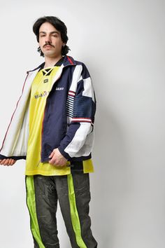 🚀Need to get your order super fast? Choose DHL Express shipping upgrade in your cart. It takes only 1-2 b. days to European Union countries and 2-5 b. days to USA, Canada and all other countries. Orders are ready to ship in 1 b. day. 🔥Vintage lightweight men's windbreaker jacket in navy blue colour by Jako. Size - L. Model is 177 cm / 5ft 9.6" tall and usually wears size M. Good vintage condition. Only 1 available! All orders are shipped every day Worldwide from 🇪🇺EU. Safe registered standar Navy Athleisure Track Jacket For Streetwear, Navy Sportswear Track Jacket For Streetwear, Navy Nylon Track Jacket For Streetwear, Sporty Blue Windbreaker For Running, Urban Navy Windbreaker For Streetwear, Navy Athleisure Windbreaker For Streetwear, Navy Sporty Track Jacket For Outdoor, Functional Navy Windbreaker For Streetwear, Navy Functional Windbreaker For Streetwear