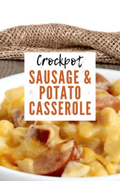 crockpot sausage and potato casserole in a white bowl with a sign