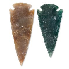 two pieces of green and brown rock type material