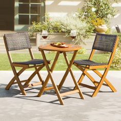 two chairs and a table with food on it