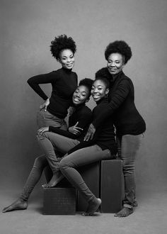 three women are posing for a black and white photo with their arms around each other