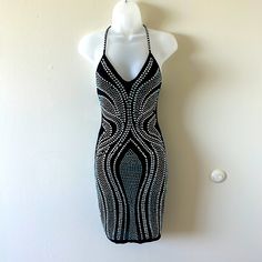 Never Worn As Cute Rhinestones On It Black Rhinestone Mini Dress For Party Season, Black Mini Dress With Rhinestones For Party Season, Silver Sleeveless Sequin Dress With Rhinestones, Black Rhinestone Bodycon Cocktail Dress, Black Rhinestone Club Dresses, Black Rhinestone Dress For Club, Black Rhinestone Dresses For Club, Black Rhinestone Dresses For Party Season, Fitted Silver Dress With Rhinestone Fringe