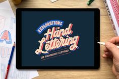 a tablet with the words hand lettering on it