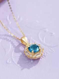 Mặt dây Vàng 14K Đá quý tự nhiên London Blue Topaz | AME Jewellery Topaz Jewelry, Halo Pendant, London Blue Topaz, London Blue, Blue Topaz, Gemstone Jewelry, Topaz, Halo, Yellow Gold