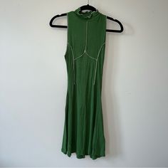 Brand New With Tags Urban Outfitters Deja Seamed Mini Dress - Womens Size Extra Small. Green And Cream Coloring. Seamed Details At The Front And Back, Mock Neckline, Fitted Into An A-Line Skirt. Cutout On The Back. Green Stretch Cotton Mini Dress, Summer High Neck Green Midi Dress, Trendy High Neck Mini Dress For Spring, High Neck Green Midi Dress For Summer, Trendy Green Cotton Mini Dress, Spring Casual Midi Dress With High Neck, Casual High Neck Midi Dress For Spring, Fitted High Neck Dress For Day Out, Fitted Green Midi Dress With High Neck