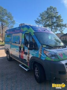 an ice cream van parked in a parking lot