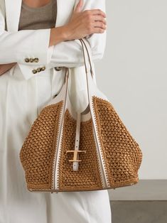 TOD'S T Timeless leather-trimmed raffia shoulder bag | NET-A-PORTER Luxury Chic Straw Bag With Leather Trim, Luxury Crochet Bag With Woven Leather Top Handle, Tan Bag Outfit, Raffia And Leather Bag, Woven Leather Top Handle Bags For On-the-go, Tods Timeless Bag, Denim Flats, Tods Bag, Tan Bag