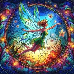 a stained glass window with a fairy on it's side and stars in the sky