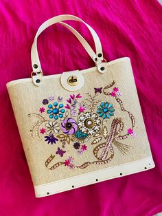 "1960s Enid Collins Style Bag with Jewel Toned Embellishments  I could not find the Enid Collins signature on this bag but it's definitely got the look!  Beautiful bouquet embellishment with jewel-tone colors. Wood bottom.  Size: 10.5\" width at bottom 12.5\" width at top  10.5\" height  6\" strap drop  Condition: Good Vintage Condition.  All sales are final. Thank you for shopping small + sustainable 💐" Vintage Embellished Rectangular Bag, Vintage Embellished Rectangular Shoulder Bag, Vintage Embellished Bag For Everyday Use, Vintage Embellished Shoulder Bag For Wedding, Vintage Embellished Wedding Shoulder Bag, Vintage Embellished Formal Shoulder Bag, Silver Sequin Top, Enid Collins, Marvelous Mrs Maisel