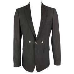 BURBERRY sport coat comes in a black & grey stripe wool with a full liner featuring a notch lapel, flap pockets, double back vent, silver tone hardware, and a single button closure. Made in Italy. Very Good Pre-Owned Condition. Small tear at hem. Marked: 50 R Measurements: Shoulder: 17.5 inches Chest: 40 inches Sleeve: 26.5 inches Length: 30 inches Reference: 120624 Category: Sport Coat More Details Brand: BURBERRY Size: 40 Chest Size: 40 Color: Black Color 2: Grey Pattern: Stripe Fabric: Wool / Burberry Blazer, Grey Pattern, Striped Fabrics, Jean Paul Gaultier, Black Blazers, Grey Stripes, Cotton Style, Sport Coat, Hugo Boss