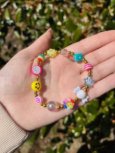 Brighten up your jewelry collection with these Y2K bracelets! If you're a 2000s baby, these are for you. Made to fit a woman's wrist. Available in 6 different styles. 2000 Bracelet, Y2k Bracelets Beads, Y2k Style Round Bead Jewelry For Gifts, Y2k Style Round Beads Jewelry As Gift, Y2k Style Round Beads Jewelry Gift, Adjustable Y2k Style Jewelry With Round Beads, Yk2 Bracelet, 2000s Bracelets, 2000 Jewelry