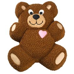 a brown teddy bear with a pink heart on its chest