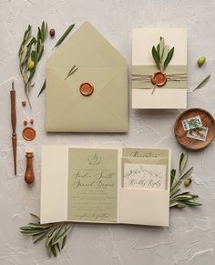 the wedding stationery is laid out and ready to be put into their guests'envelopes