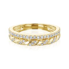 a yellow gold ring with diamonds on it