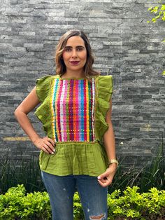 This feminine vintage style shirt is beautifully made. Colorful flowers, it is a unique one of a kind. Since it is hand embroidered, each flower is slightly different. It is made of cotton and it extremely comfortable. Beautiful Blouse, made with 100% cotton blanket, dyed in bright colors. The ruffles that distinguish this blouse are made by hand, by artisans from Chiapas. Beautiful blouse, you can use it with jeans, leggings, skirts, it is a very elegant blouse and has a beautiful and fine embr Spring Folk Blouse With Woven Motifs, Green Cotton Shirt With Floral Embroidery, Spring Embroidered Green Shirt, Spring Green Embroidered Shirt, Green Embroidered Shirt For Spring, Green Traditional Embroidered Top For Spring, Traditional Green Embroidered Top For Spring, Bohemian Blouse With Woven Motifs, Traditional Green Blouse For Spring