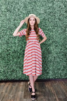 This modest striped dress has pocket and short sleeves. It is red multicolor and makes a great outfit for spring and summer. It is casual and colorful. It is a long midi and can be worn to work. Shop now! #stripeddress #modestdresses Stripes Outfit Ideas, Stripes Outfit, Short Dress Patterns, Outfit Ideas For Spring, Outfit For Spring, Pentecostal Fashion