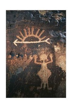 an ancient rock painting depicting the sun and two people