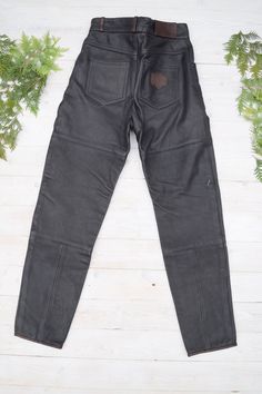 "Strong un and thick leather moto pants in excellent condition. PLEASE CHECK ALL MEASUREMENTS BELLOW: Length: 106 cm / 42\" Waist: 72 cm / 28\" Hips: 102 cm / 40\" Inseam: 77 cm /30\" Fabric: leather, polyester Brand: Frank Thomas Condition: excellent * dry clean only LOOK FOR OTHER COOL VINTAGE CLOTHING HERE: https://www.etsy.com/shop/OnTheRoadStore KEEP IN MIND: Photo might be slightly different from actual item in terms of color due to the lighting during photo shooting or your monitor's disp Biker Style Full-length Leather Pants For Biker Events, Full Length Biker Leather Pants For Biker Events, Fitted Leather Biker Pants For Motorcycling, Biker Style Leather Pants For Streetwear, Black Leather Moto Bottoms, Black Biker Leather Pants Full Length, Black Fitted Leather Pants For Motorcycling, Fitted Black Leather Pants For Motorcycling, Black Full-length Biker Leather Pants