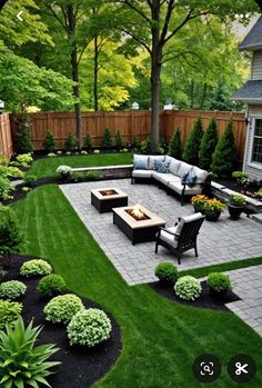 an outdoor patio with couches and tables in the middle of it, surrounded by green grass