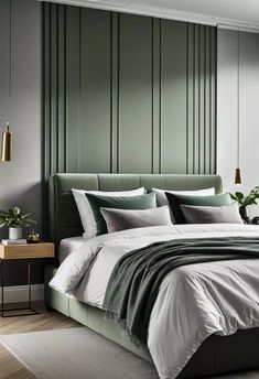 a large bed sitting in a bedroom next to a wall with green paneled walls