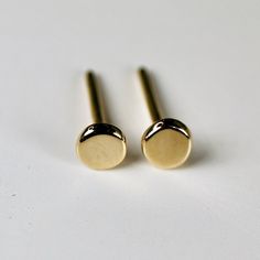 14k gold minimalist stud earrings. Round shape, circle delicate studs. These sweet little circle earrings are post/stud style and included silicon backings. You can choose 14k earrings backing from drop down menu. Circles are approximately 1/8" inch (3mm) diameter. You can purchase single or pair and with push back post and backings or screw post and backings. Please choose from drop down menu. * All our raw materials are sourced from US-based companies for the quality and safety of our handmade Minimalist Yellow Gold Round Cartilage Earrings, Minimalist Round 14k Gold Cartilage Earrings, Minimalist 14k Gold Cartilage Earrings As Gift, Minimalist 14k Gold Round Earrings, Minimalist Rounded Earrings For Gift, Minimalist Rounded Earrings For Gifts, Minimalist Rose Gold Circle Earrings, Minimalist Tarnish-resistant Round Cartilage Earrings, Minimalist Rose Gold Round Earrings