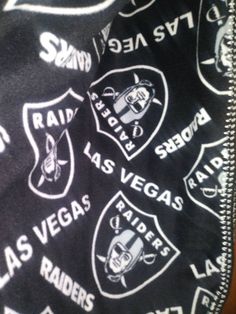 the las vegass logo is printed on a black jacket with white letters and numbers