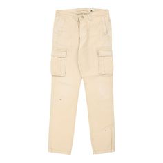 Vintage Bltd beige cargo trousers, fit a 32" waist and 30" inseam. WAIST: 32 inches / 81cmsINSEAM: 30 inches / 76cmsRISE: 10 inches / 25cmsGENDER: mens CONDITION: good - marks on front and back.STYLE: cargo trousersERA: 1990sCOLOUR: beigeFABRIC: cotton blend Mid-rise Beige Cargo Jeans With Side Pockets, Cream Straight Leg Utility Cargo Pants, Cream Straight Leg Cargo Pants With Patch Pockets, Beige Utility Pants With Flap Pockets, Fitted Beige Chinos With Pockets, Beige Straight Leg Pants With Multiple Pockets, Beige Straight Leg Chinos With Patch Pockets, Beige Straight Leg Cargo Pants With Flap Pockets, Beige Straight Leg Cargo Jeans With Multiple Pockets