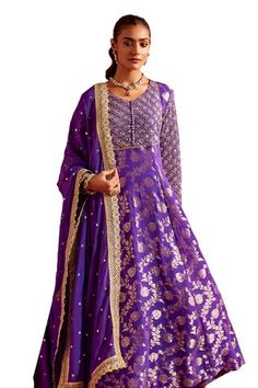 Purple banarasi anarkali with floral woven pattern and sequins embroidered yoke and sleeves. Comes with churidar and a mirror work dupatta. - Aza Fashions Anarkali Slub Silk Choli For Festivals, Semi-stitched Art Silk Anarkali Set For Eid, Anarkali Choli In Slub Silk For Festivals, Anarkali Salwar Kameez With Pallu, Anarkali Traditional Wear With Zari Work For Eid, Anarkali Salwar Kameez With Zari Work For Diwali, Eid Anarkali Choli With Zari Work, Anarkali Dola Silk Traditional Wear For Navratri, Diwali Anarkali Traditional Wear With Zari Work