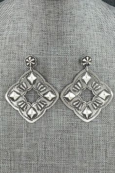 "These beautifully crafted sterling silver earrings were made by Navajo silversmith Lane Tahe. The backs are signed and stamped sterling. Length: 2 3/8\" Width: 1 7/8\" Free shipping on all orders! We ship with USPS and always include tracking. All orders ship within a day of payment. Returns are accepted up to 30 days after you receive your order. Just send us a message. Our shop offers cash back or store credit. The item must be returned in new condition." Nickel Free Silver Southwestern Earrings, Decorative Silver Earrings As Gift, Silver Concho Earrings As A Gift, Silver Concho Earrings For Gift, Southwestern Silver Concho Earrings, Traditional Silver Etched Earrings, Traditional Etched Silver Earrings, Elegant Silver Concho Earrings, Artisan Sterling Silver Etched Earrings