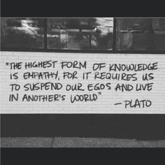 a sign on the side of a building that says, the highest form of knowledge is empty for it requires us to spend our eggs and live in another world