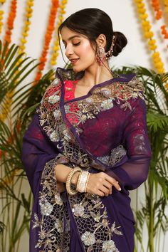 Dark purple pure georgette saree with intricate cutwork and sequins hand embroidered motifs. Paired with embroidered blouse.
Component: 2
Pattern: Embroidered
Type Of Work: Floral
Sleeve Type: Short Sleeves
Fabric: Pure Georgette
Color: Purple
Other Details: 
Floral motifs
Cutwork panels
Occasion: Sangeet - Aza Fashions Embroidered Purple Georgette Pre-draped Saree, Purple Georgette Pre-draped Saree For Festivals, Purple Georgette Pre-draped Saree For Eid, Purple Georgette Blouse With Intricate Embroidery, Navratri Chikankari Embroidery Blouse In Georgette, Eid Georgette Pre-draped Saree With Intricate Embroidery, Purple Intricate Embroidered Georgette Fabric, Purple Embroidered Georgette Fabric Saree, Purple Embroidered Georgette Blouse Piece