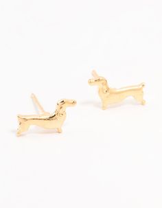 Dog lovers will adore these charming Gold Dachshund Stud Earrings, adding a playful yet sophisticated touch to any look. Crafted from sleek metal, they capture the beloved pup's whimsical spirit with a polished, effortless finish.. Dimensions: Length 5 mm x Width 10 mm | Lovisa Gold Dachshund Stud Earrings Dachshund, Dog Lovers, Sleek, Stud Earrings, Gold, Quick Saves