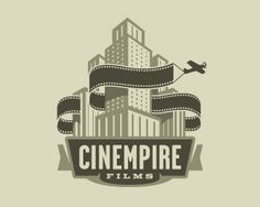 the logo for a movie studio with an airplane flying over it and some buildings in the background