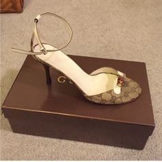 Gucci Sandals Lightly Used Gucci Ankle Strap Sandals For Formal Occasions, Gucci Ankle Strap Sandals With Padded Heel, Gucci Ankle Strap Sandals, Elegant Gucci Sandals For Spring, Gucci White Formal Sandals, White Gucci Sandals For Formal Occasions, White Gucci Formal Sandals, Designer Beige Ankle Strap Sandals, Gucci Open Toe Heels With Branded Heel Counter